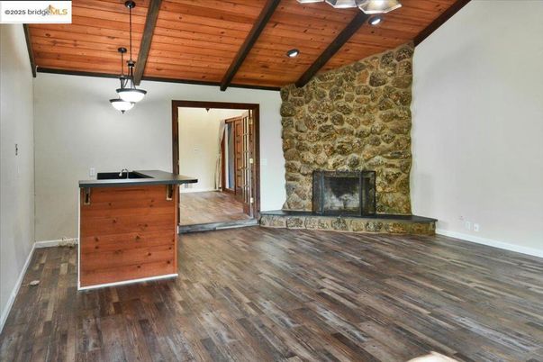 Fireplace, Interior, Pendant Lights, Recessed Lighting, Wooden Beams, Wooden Ceilings, Wood Texture Flooring