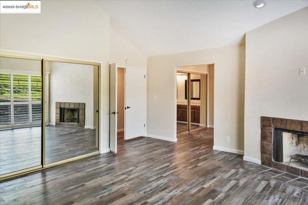 Empty room, Fireplace, Interior, Recessed Lighting, Wood Texture Flooring