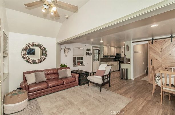 Dining room, Interior, Kitchen, Living room, Recessed Lighting, Stainless Steel Appliances, Wood Texture Flooring
