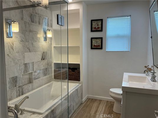 Bathroom, Glass Shower, Interior, Marble Walls, Wood Texture Flooring