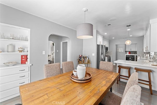 Dining room, Interior, Kitchen, Pendant Lights, Recessed Lighting, Stainless Steel Appliances, Wood Texture Flooring