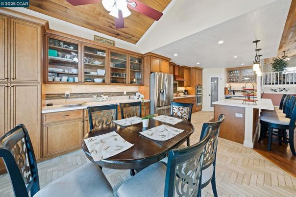 Dining room, Interior, Kitchen, Recessed Lighting, Stainless Steel Appliances, Wood Texture Flooring
