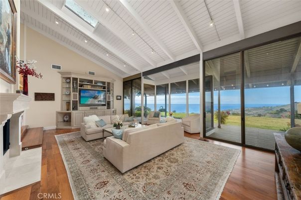 Fireplace, Interior, Living room, Recessed Lighting, Water, Wood Texture Flooring