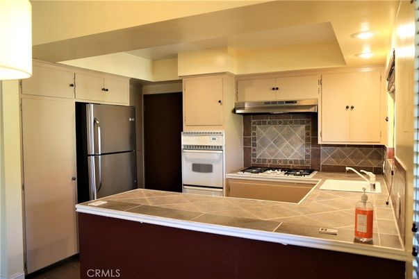 Interior, Kitchen, Recessed Lighting, Tile Countertops