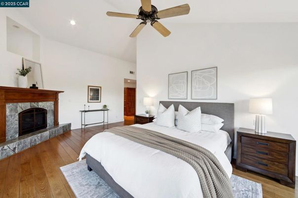 Bedroom, Fireplace, Interior, Recessed Lighting, Wood Texture Flooring