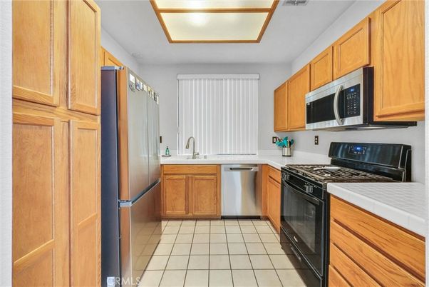 Interior, Kitchen, Stainless Steel Appliances, Tile Countertops