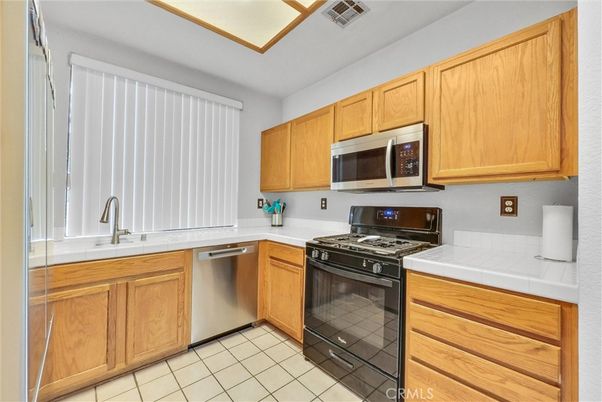 Interior, Kitchen, Stainless Steel Appliances, Tile Countertops