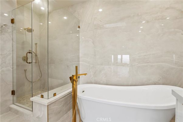 Bathroom, Free Standing Baths, Glass Shower, Interior, Marble Walls, Recessed Lighting