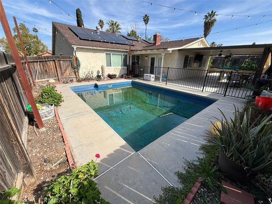 Exterior, Pool, Solar Panels