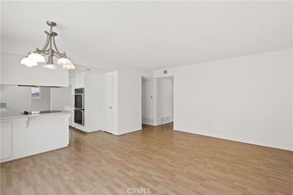 Chandelier, Empty room, Interior, Kitchen, Stainless Steel Appliances, Wood Texture Flooring