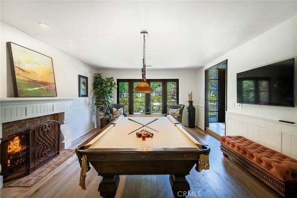 Billiard Table, Fireplace, Game Room, Interior, Pendant Lights, Recessed Lighting, Wood Texture Flooring