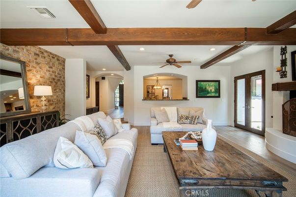 Fireplace, Interior, Living room, Recessed Lighting, Stone Walls, Wooden Beams, Wood Texture Flooring