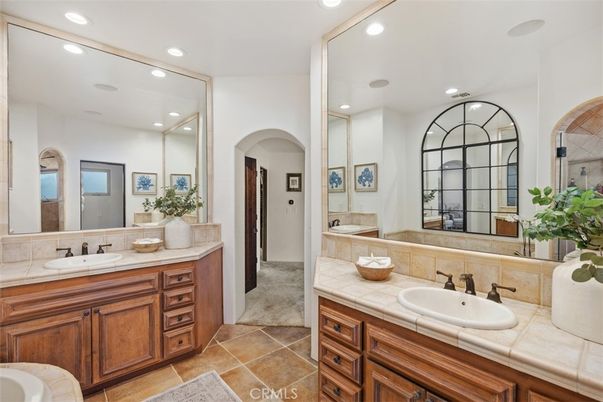 Bathroom, Dual Sink Vanities, Interior, Recessed Lighting, Tile Countertops