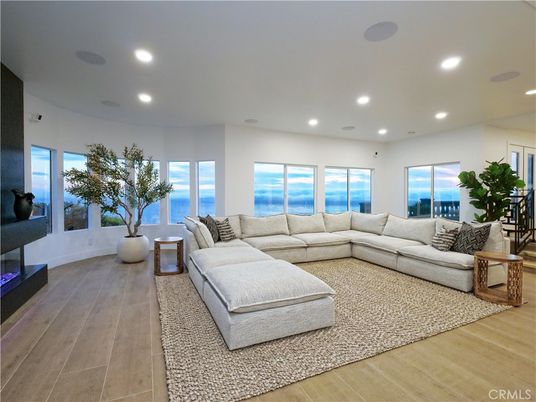 Fireplace, Interior, Living room, Recessed Lighting, Water, Wood Texture Flooring