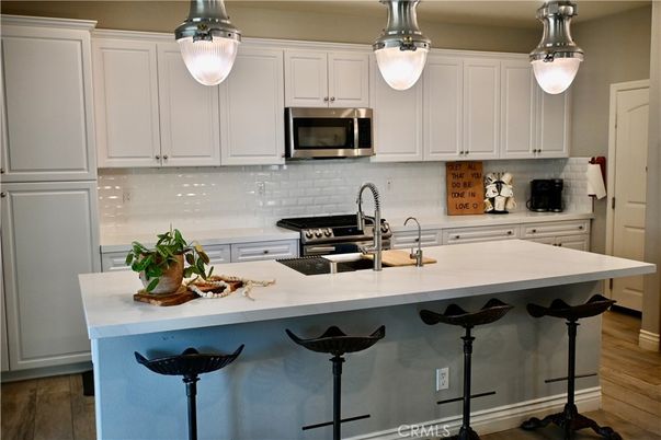 Interior, Kitchen, Pendant Lights, Stainless Steel Appliances, Wood Texture Flooring