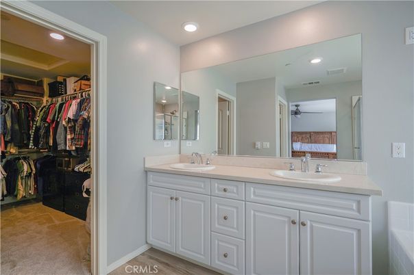 Bathroom, Dual Sink Vanities, Interior, Recessed Lighting, Walk-in Closets