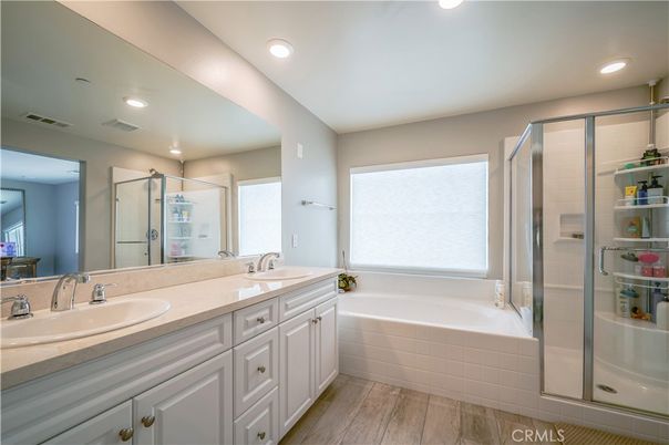 Bathroom, Dual Sink Vanities, Glass Shower, Interior, Recessed Lighting, Wood Texture Flooring