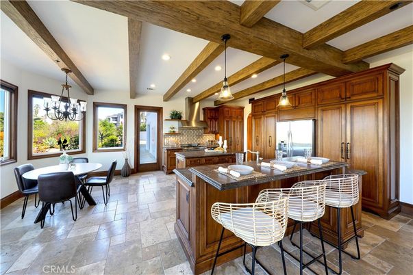 Chandelier, Dining room, Interior, Kitchen, Pendant Lights, Recessed Lighting, Stainless Steel Appliances, Wooden Beams