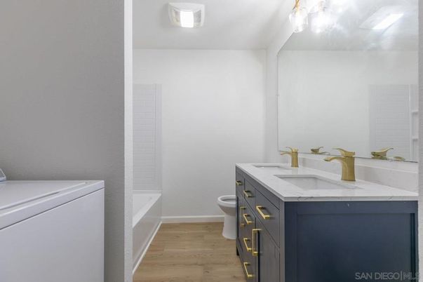 Bathroom, Interior, Washer, Wood Texture Flooring