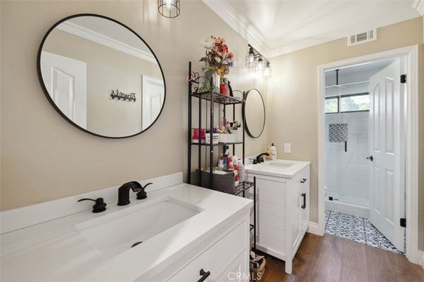 Bathroom, Dual Sink Vanities, Glass Shower, Interior, Wood Texture Flooring
