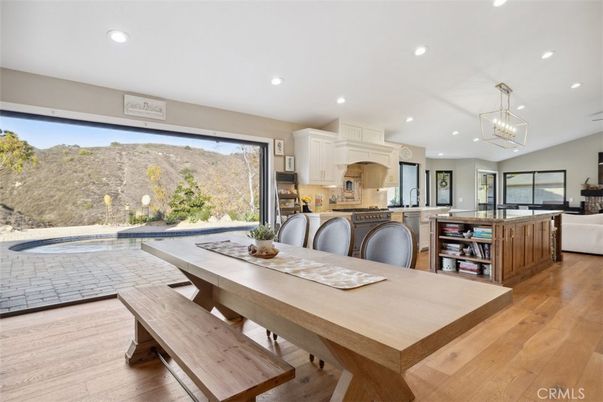 Dining room, Interior, Kitchen, Living room, Pendant Lights, Recessed Lighting, Stainless Steel Appliances, Wood Texture Flooring