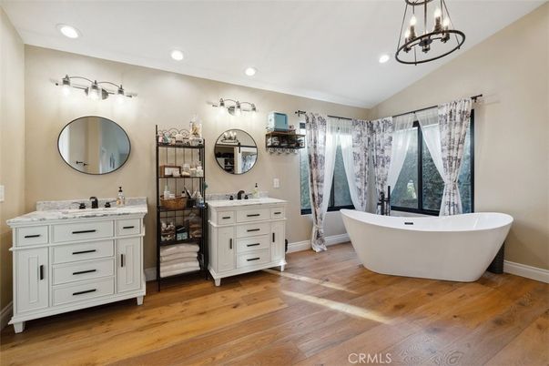 Bathroom, Dual Sink Vanities, Free Standing Baths, Interior, Pendant Lights, Recessed Lighting, Wood Texture Flooring