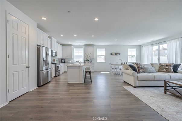 Dining room, Interior, Kitchen, Living room, Recessed Lighting, Stainless Steel Appliances, Wood Texture Flooring