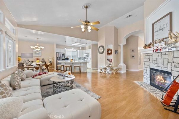 Chandelier, Dining room, Fireplace, Interior, Kitchen, Living room, Pendant Lights, Stainless Steel Appliances, Wood Texture Flooring