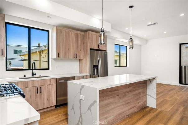 Interior, Kitchen, Pendant Lights, Recessed Lighting, Stainless Steel Appliances, Wood Texture Flooring