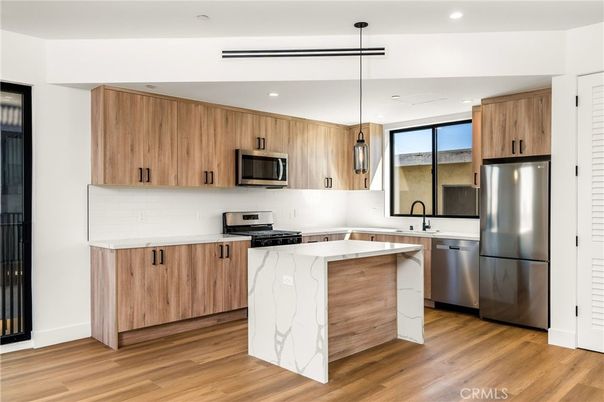 Interior, Kitchen, Pendant Lights, Recessed Lighting, Stainless Steel Appliances, Wood Texture Flooring