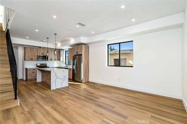 Interior, Kitchen, Pendant Lights, Recessed Lighting, Stainless Steel Appliances, Wood Texture Flooring