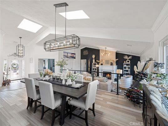 Chandelier, Dining room, Fireplace, Interior, Living room, Pendant Lights, Wood Texture Flooring