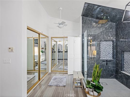 Bathroom, Glass Shower, Interior, Marble Walls, Wood Texture Flooring