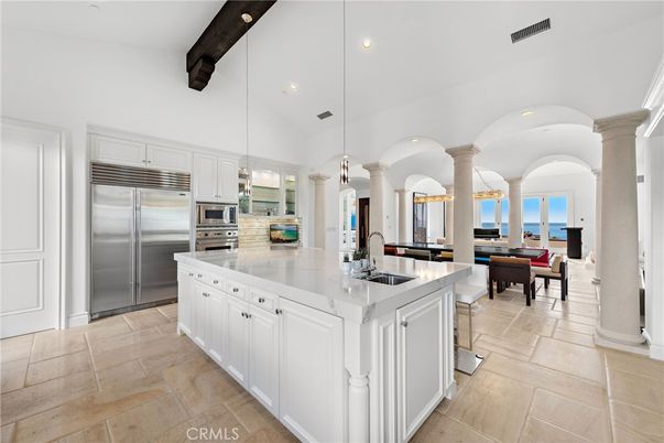 Dining room, Interior, Kitchen, Pendant Lights, Recessed Lighting, Stainless Steel Appliances, Water, Wooden Beams
