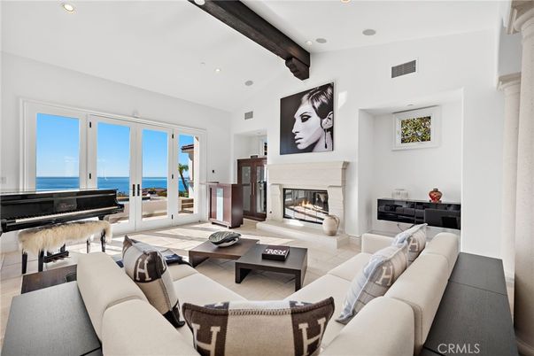 Fireplace, Interior, Living room, Piano, Recessed Lighting, Water, Wooden Beams