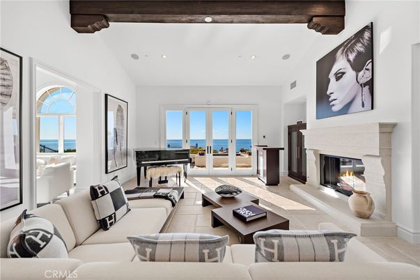 Fireplace, Interior, Living room, Piano, Recessed Lighting, Water, Wooden Beams