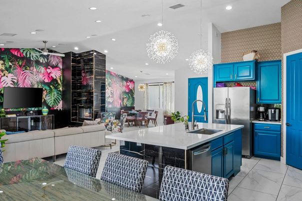 Chandelier, Dining room, Fireplace, Interior, Kitchen, Living room, Marble, Pendant Lights, Recessed Lighting, Stainless Steel Appliances