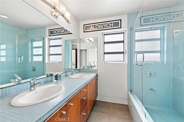 Bathroom, Dual Sink Vanities, Glass Shower, Interior, Recessed Lighting, Tile Countertops