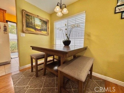 Chandelier, Dining room, Interior, Pendant Lights, Wood Texture Flooring