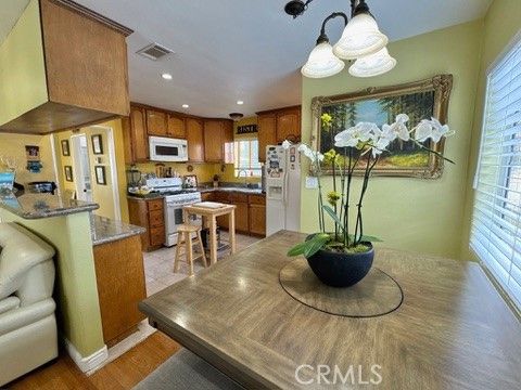 Chandelier, Interior, Kitchen, Recessed Lighting, Stainless Steel Appliances, Wood Texture Flooring