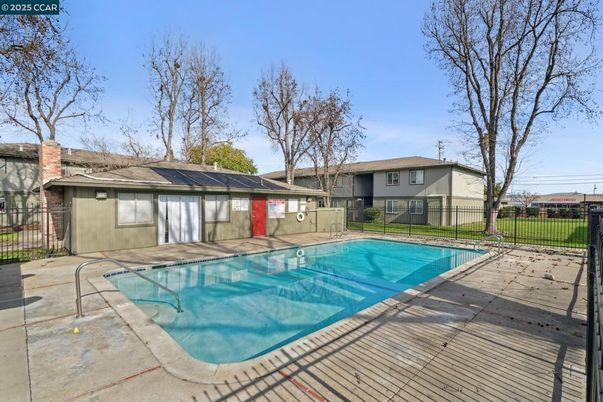 Exterior, Pool, Solar Panels