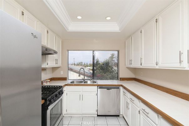 Interior, Kitchen, Recessed Lighting, Stainless Steel Appliances, Tile Countertops