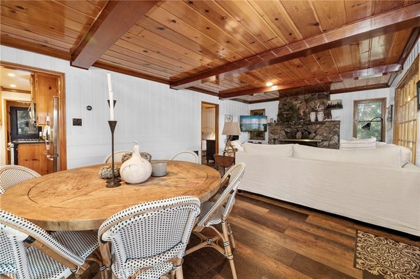 Dining room, Fireplace, Interior, Living room, Recessed Lighting, Stone Walls, Wooden Beams, Wooden Ceilings, Wood Texture Flooring