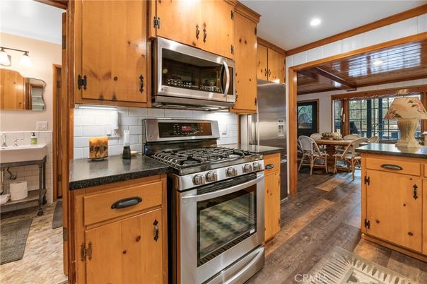 Dining room, Interior, Kitchen, Recessed Lighting, Stainless Steel Appliances, Wooden Beams, Wooden Ceilings, Wood Texture Flooring