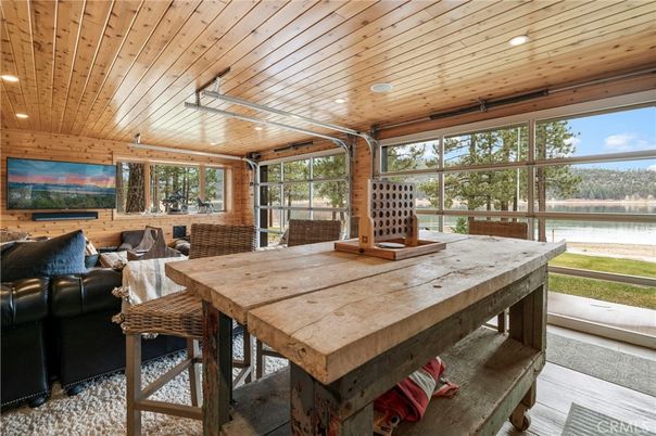 Dining room, Interior, Recessed Lighting, Sun Room, Water, Wooden Ceilings, Wood Texture Flooring