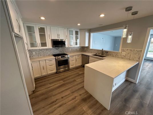 Interior, Kitchen, Pendant Lights, Recessed Lighting, Stainless Steel Appliances, Wood Texture Flooring
