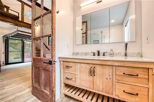 Bathroom, Dual Sink Vanities, Interior, Recessed Lighting, Wood Texture Flooring