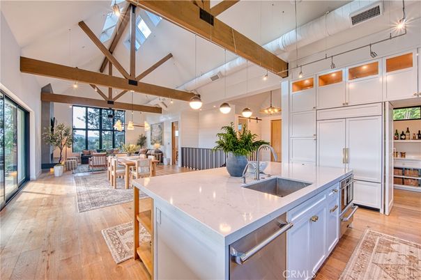 Dining room, Interior, Kitchen, Living room, Pendant Lights, Recessed Lighting, Stainless Steel Appliances, Wooden Beams, Wood Texture Flooring