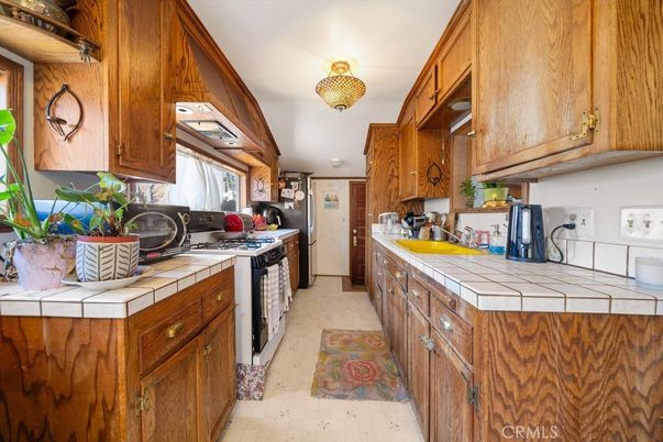 Interior, Kitchen, Tile Countertops, Washer
