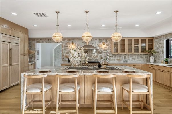 Interior, Kitchen, Pendant Lights, Recessed Lighting, Stainless Steel Appliances, Stone Walls, Wood Texture Flooring